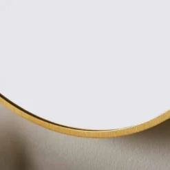 Docklands 600mm Brushed Brass Round Framed Bathroom Mirror - Origins Living -Bathroom Sales Shop B375523 docklands round mirror 60 brushed brass frame closeup